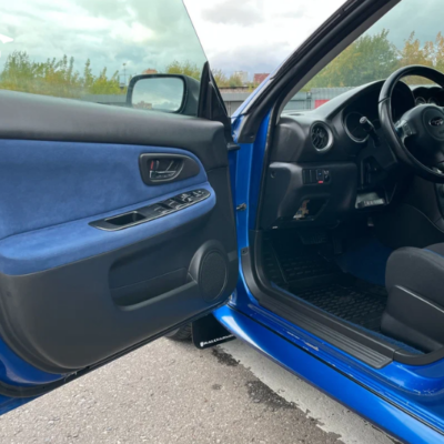 Bọc da tapi cửa xe Subaru WRX