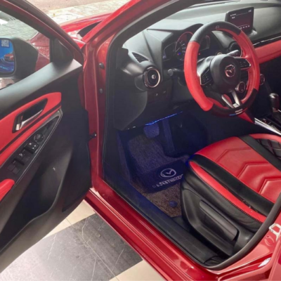 Bọc da tappi cửa xe Mazda 2
