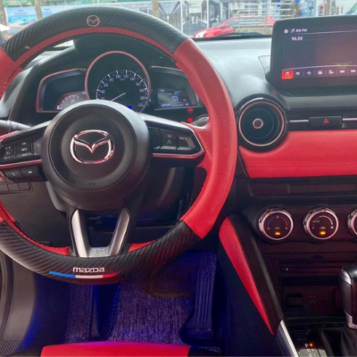 Bọc vô lăng xe Mazda 2