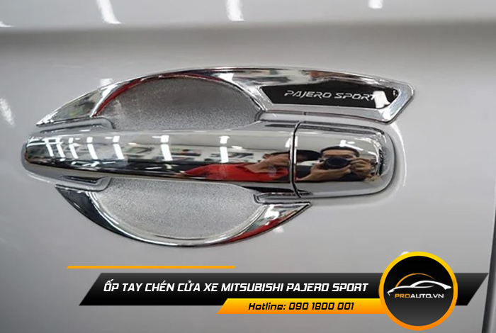op tay chen cua xe mitsubishi pajero sport