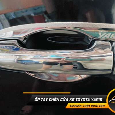 op tay chen cua xe toyota yaris 1