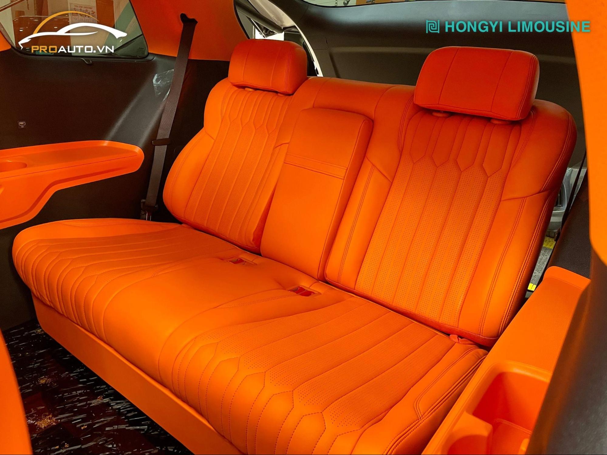 Độ sofa bed 4.0 Luxury màu cam cho Kia Carnival