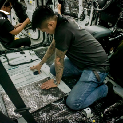 Thi công dán cách âm sàn xe 