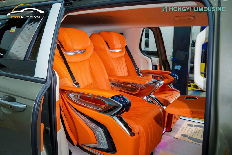 Kia Carnival độ ghế Crystal 4.0 Pro Max màu cam